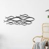 Wandkunst aus Metall mit Fischschwarm